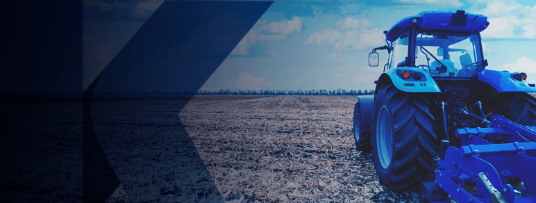 Banner com a foto de um trator em um plantação.